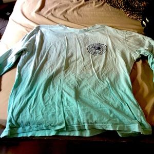 I am selling this south padre shirt it is blue